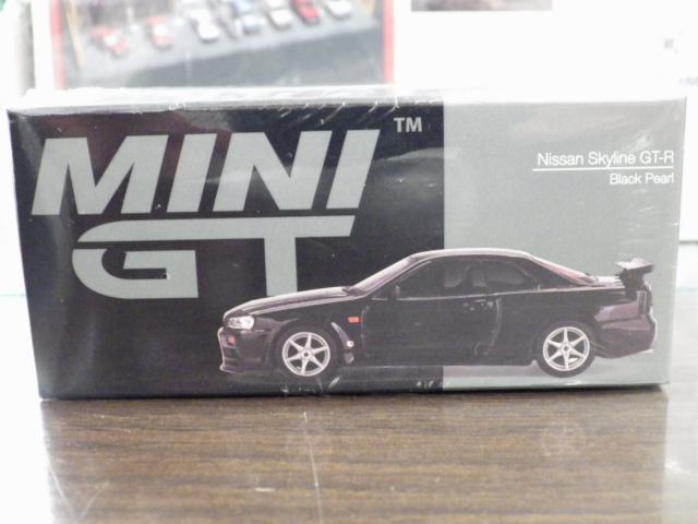 1/64 MINI GT 570 Nissan Skyline GT-R R34 V-Spec 右ハンドル【ブラック】