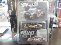 1/64 MINI GT 860 { Y GT-R NISMO GT3 SGTV[Y 2023 PONOS GAINER GT-R GAINER nhdl